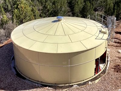 Completed elevated bolted steel storage tank installation for industrial or municipal use