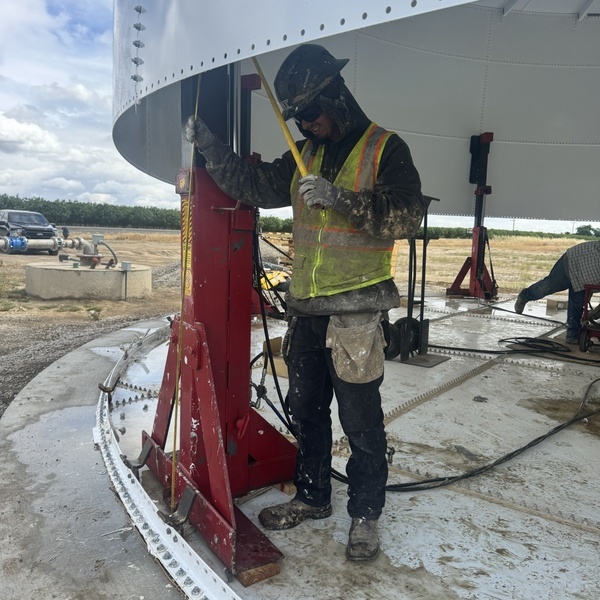 Tank Installation in field with Jack